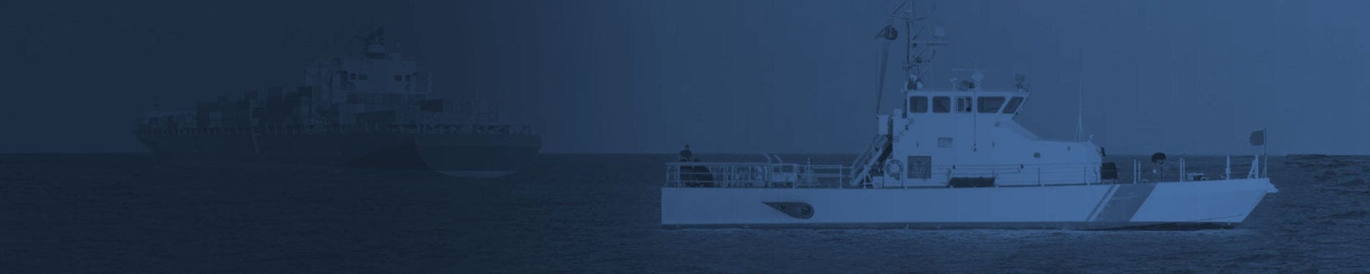 Coast guard ship in the sea with a blue tint